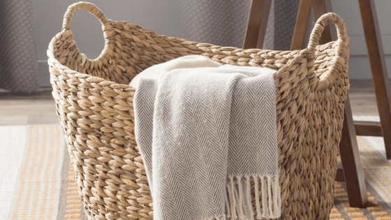 A catch-all basket placed in a high traffic area is a great way to conquer clutter in your house.