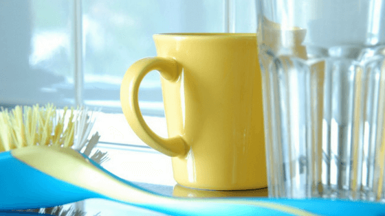 A clean mug and glass- Prevent a messy house by cleaning up after yourself.