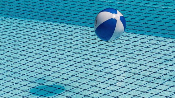 Ball on a net in a swimming pool.