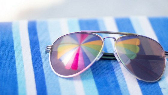 Sunglasses on a striped background