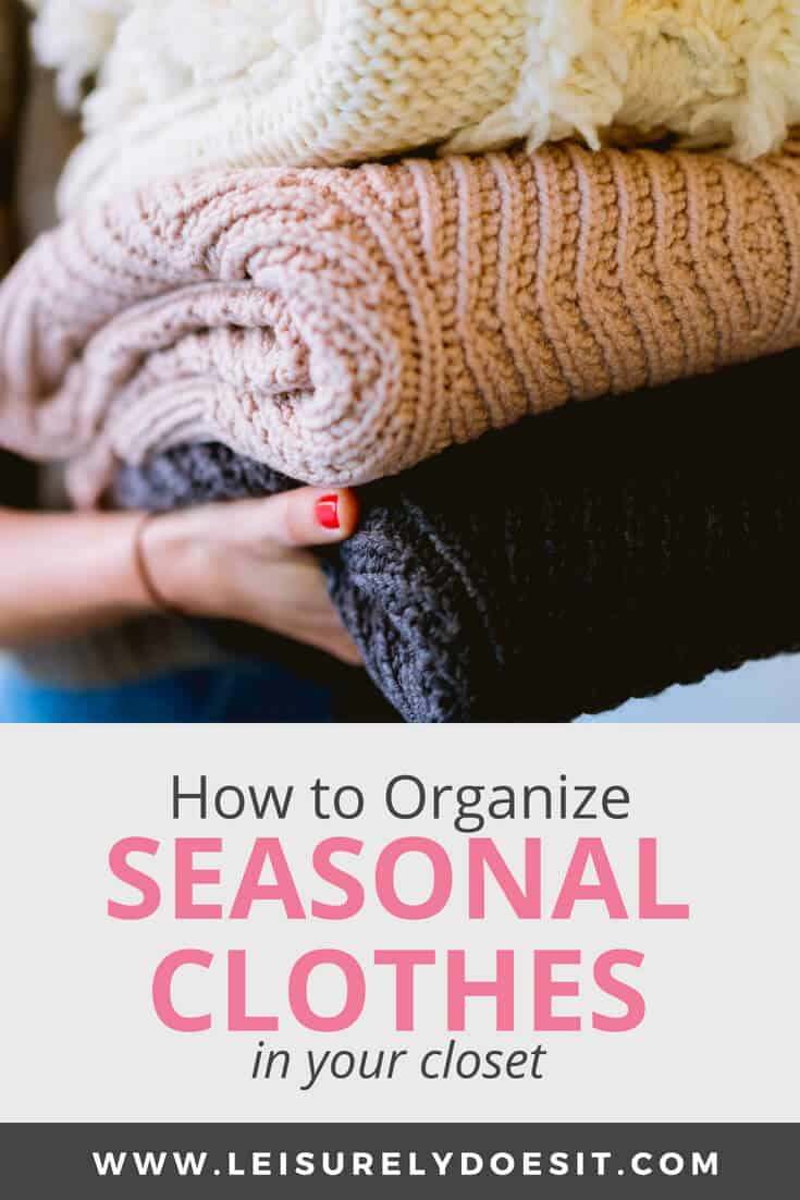 Woman holding sweaters - How To Organize Seasonal Clothes in your Closet