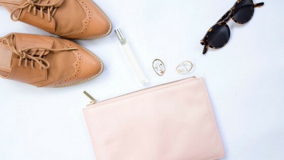 Pink cosmetic bag, shoes and sunglasses