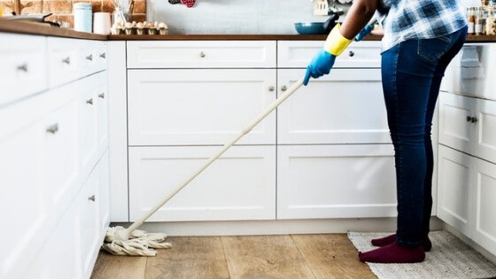 The Ultimate Christmas Cleaning Checklist- How To Clean For The Holidays- Mopping the Floor