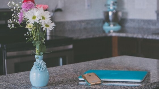 To maintain kitchen counter organization, remove clutter that doesn't belong daily.