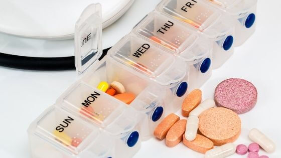 Use a pill organizer to pack travel necessities like medication.