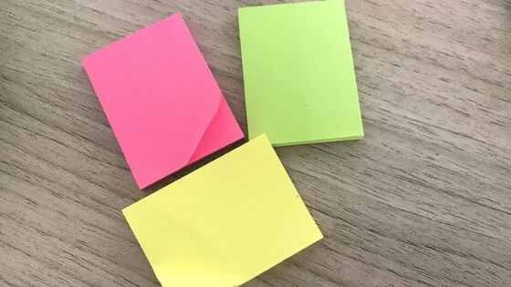 Sticky notes - Keep similar items grouped together when organizing your home office.