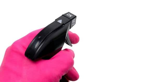 Spray bottle and pink gloves - How to disinfect your house